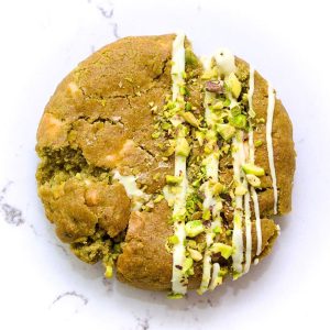Pistachio, Matcha & White Chocolate cookie with green hue and white chocolate chunks