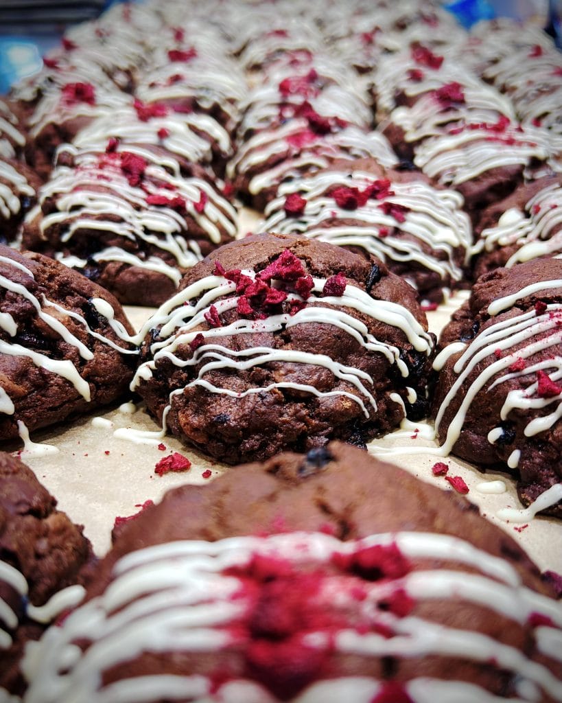 freshly-baked-cookies-in-the-bakery.jpg Freshly baked gourmet cookies cooling after baking