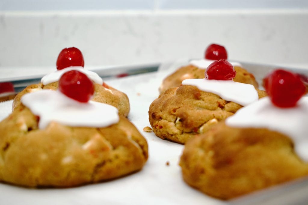 Why chill cookie dough? Cherry Bakewell cookies baked from chilled dough with thick centres and controlled spread